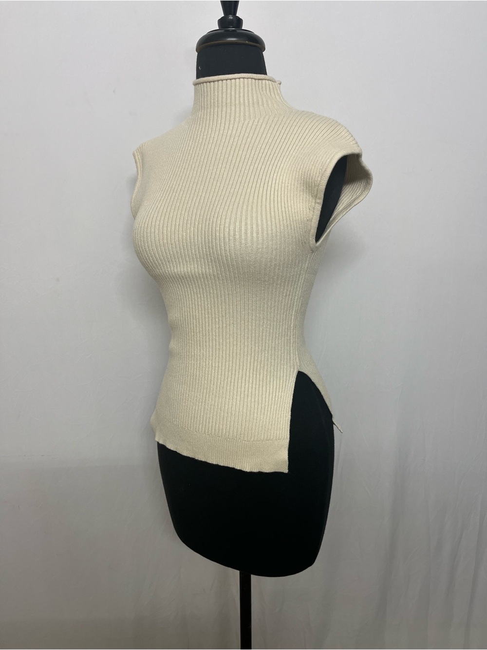 Vici Cream Sleeveless Turtleneck Ribbed Knit Top
